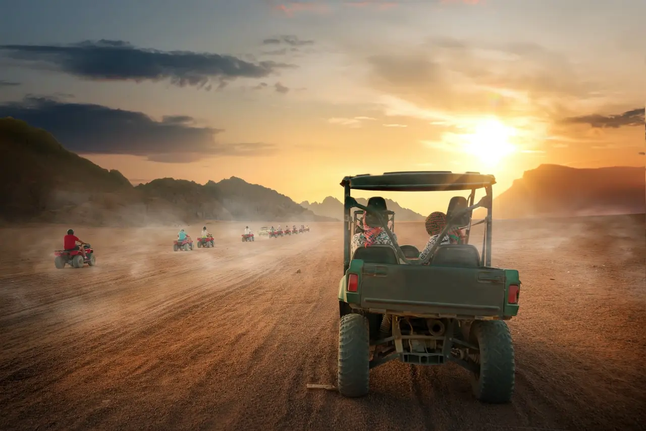 Buggy driving into the desert at sunset on a Hurghada safari